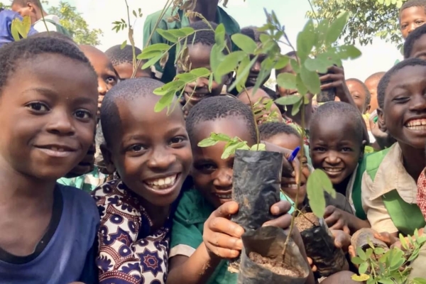 kids with trees in Malawi