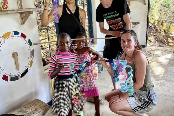 interns with kids in Malawi