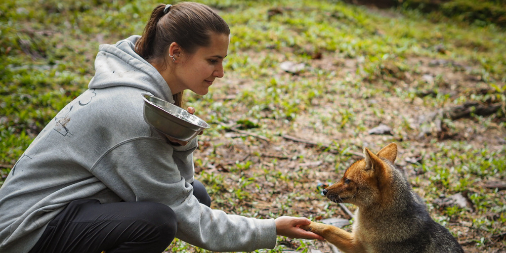 woman with animal in Ecuador