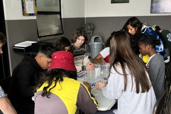 volunteers teaching local kids