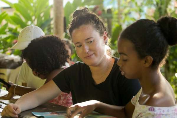intern in Brazil working with a local girl