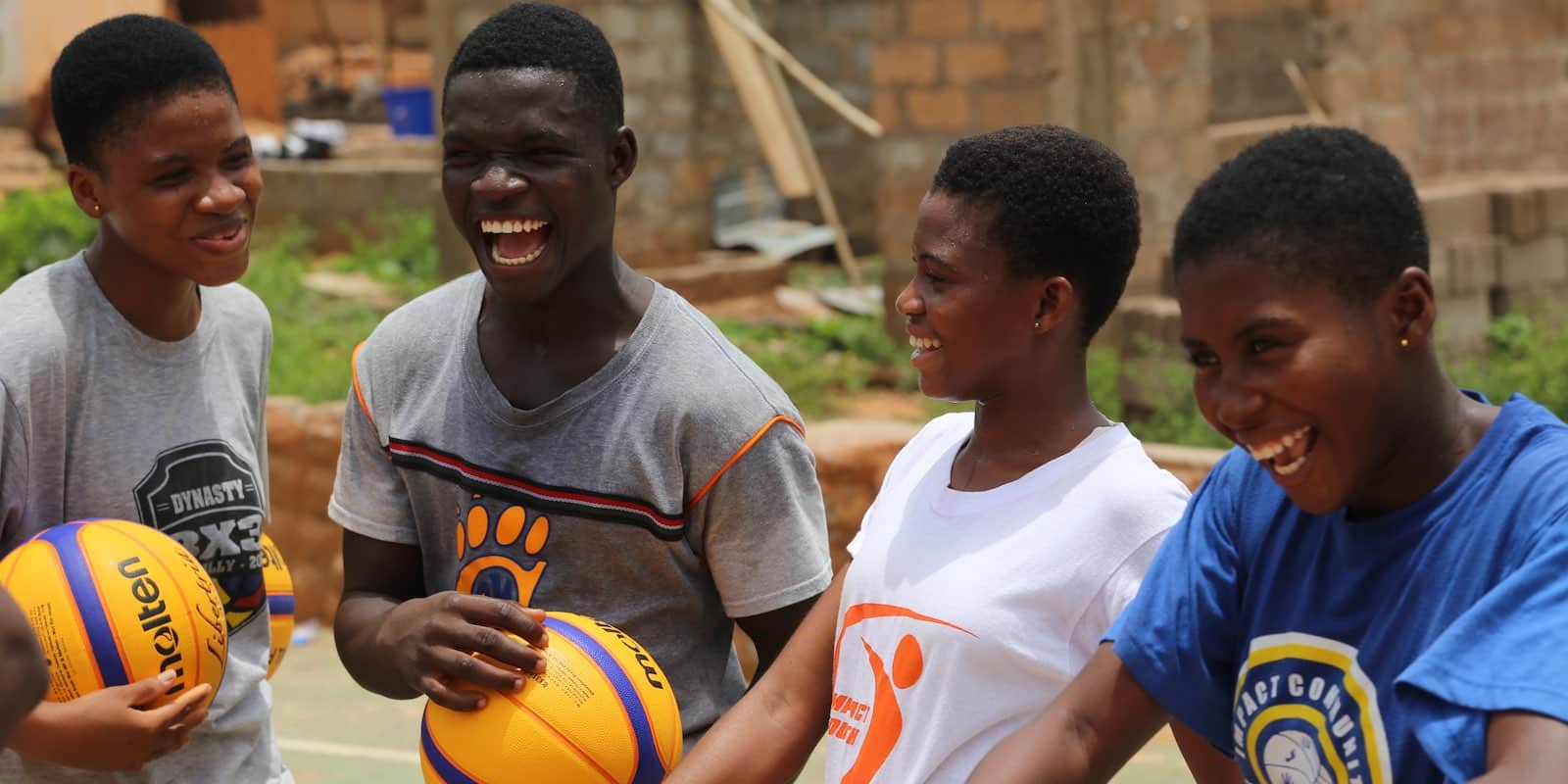 young local boys in Ghana laughing together