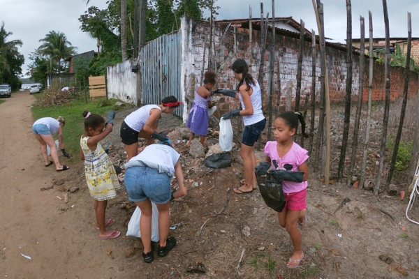 kids actively participating in waste management and environmental cleanup efforts