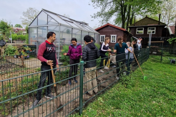 Volunteers helping in the gardens