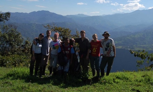 a picture of a group of volunteers outside