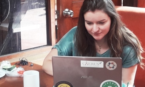 intern behind laptop