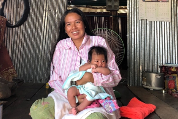 Woman holding her baby