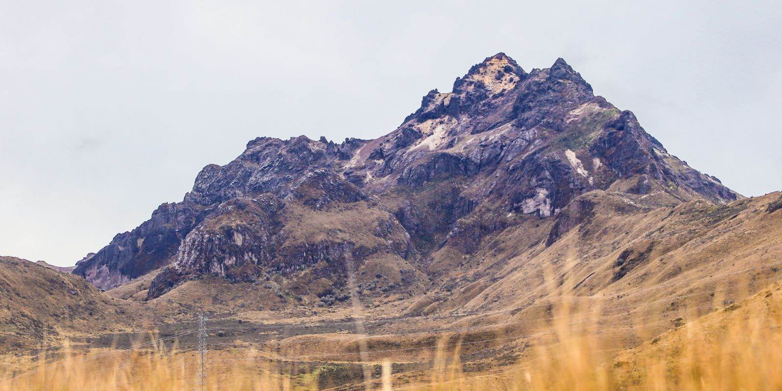 brown grass field near the mountain in Pichincha, Ecuador