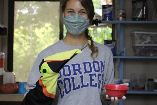 Girl ready to feed birds with hand puppet