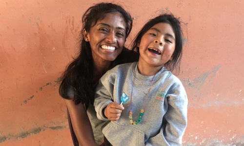 Girl with smiling child