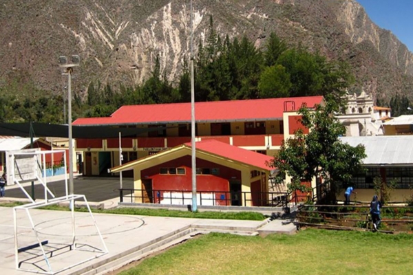 A school with a playground in the middle of a mountain