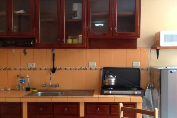a kitchen in a hostel in Peru