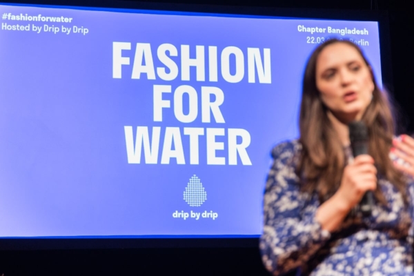 Lady giving presentation about fashion for water