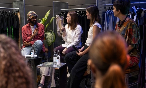 Panel discussions with in clothing store setting
