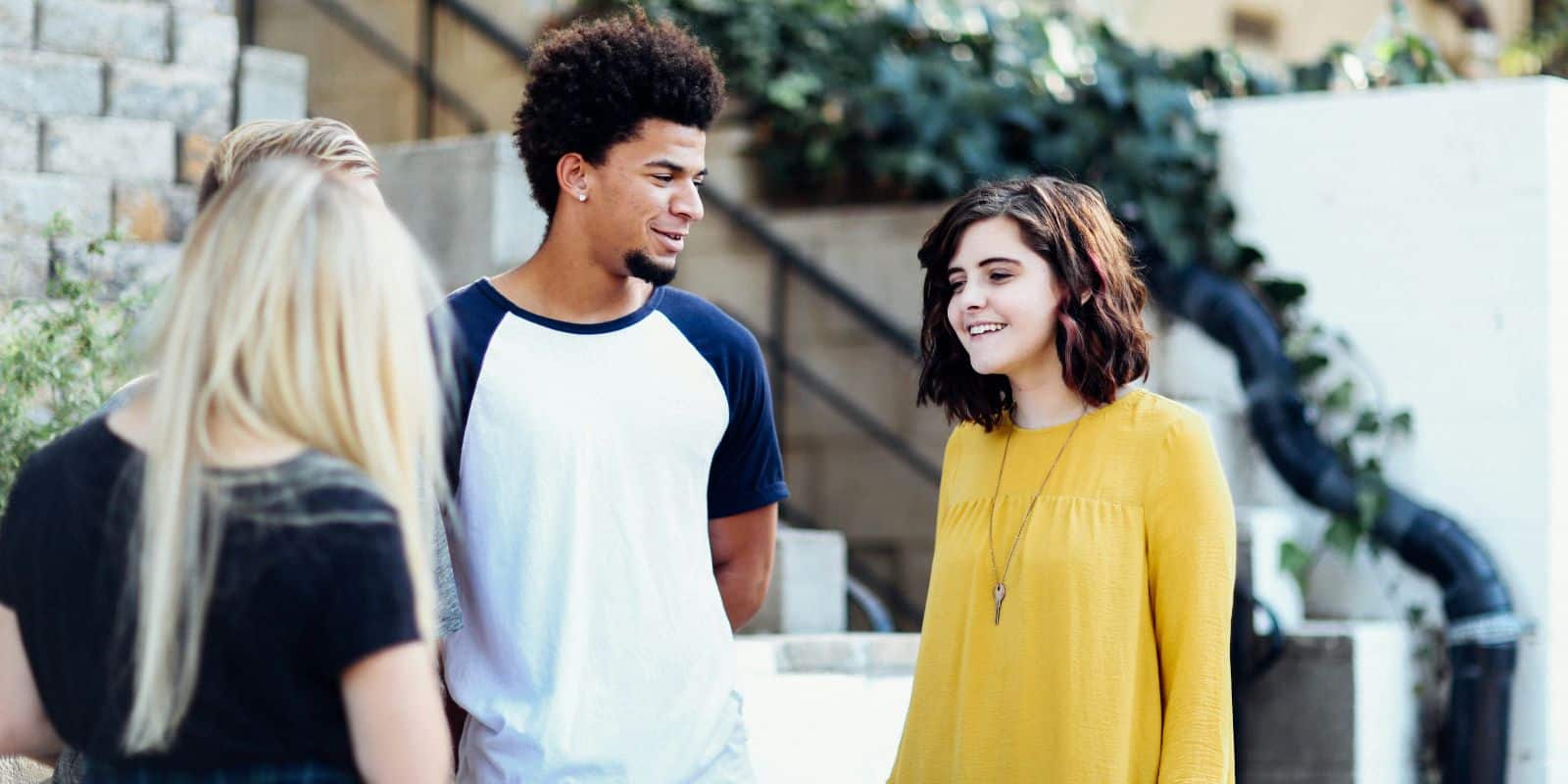 a group of interns talking with each other