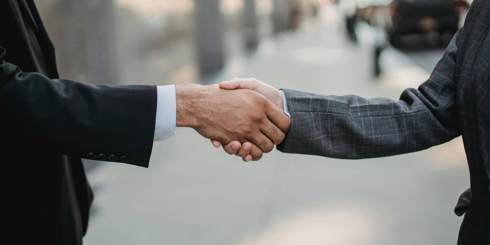 corporate employees shaking hands