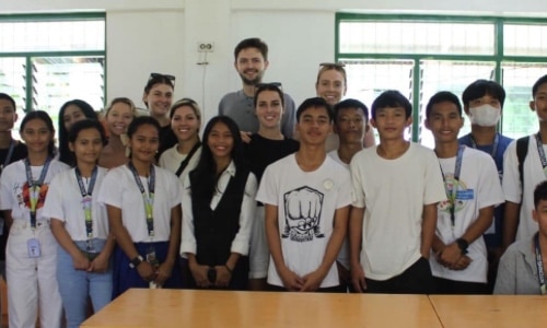 volunteers with a group of kids from Tacloban