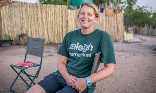 Raleigh volunteer sitting in a chair