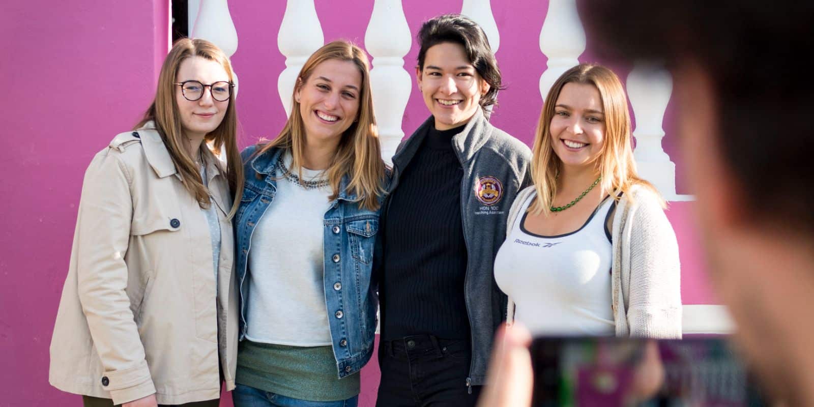 Group of sustainable volunteers standing together for a photo