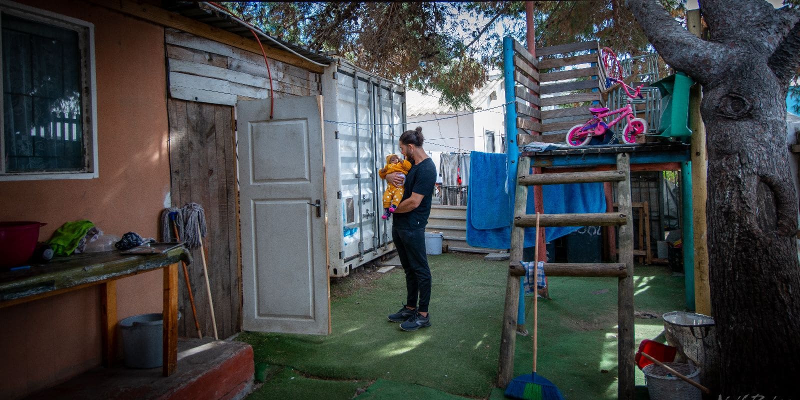 Event management intern holding a baby