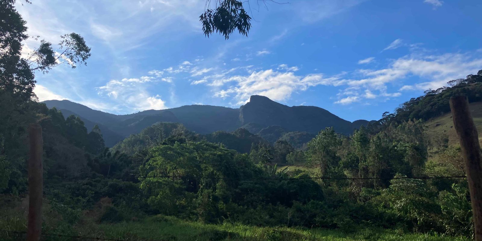 A great view overlooking the mountains and blue sky.