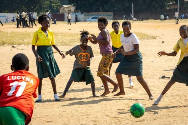 Kids playing football in Zambia.