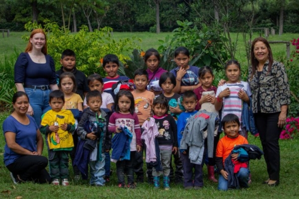 A group of children with interns in Latin America.