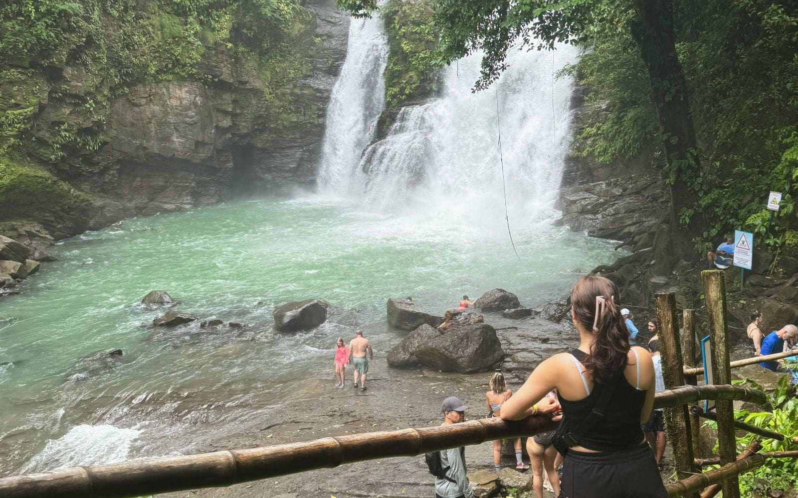 Kylie looking at the waterfall while in Costa Rica for her wildlife husbandry internship.