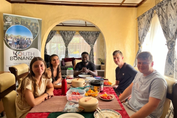 A group of interns enjoying a meal together.