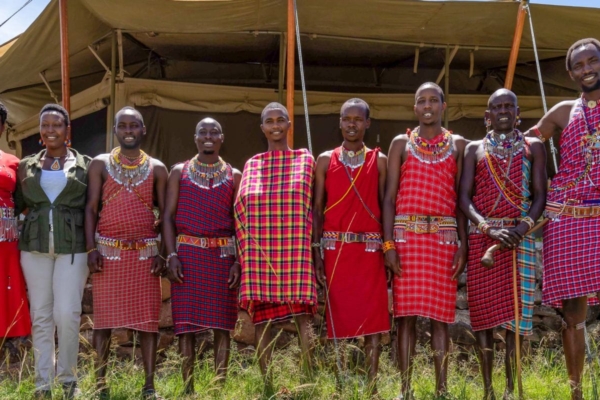 A group of locals in Kenya posing for a picture.