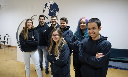 NGO Management interns with Omnis Factum smiling together