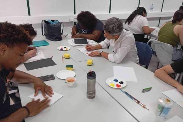 A group of interns working on their arts and crafts.