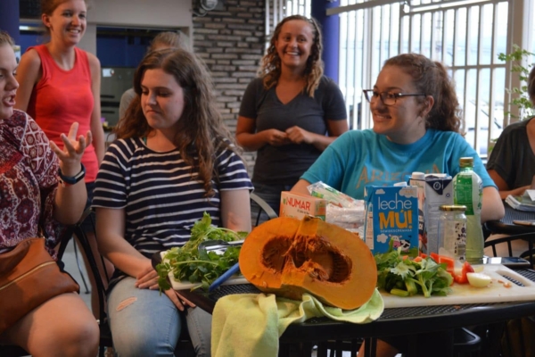 DSC_0065 (1) Interns in Latin America enjoying preparing food together.