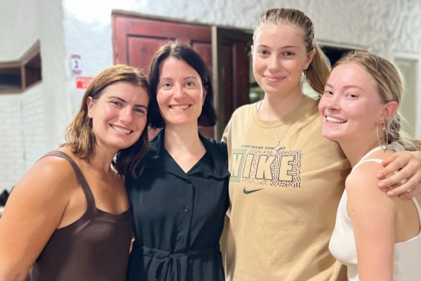 IMG_9773 A group of four interns in Latin America posing for a picture.