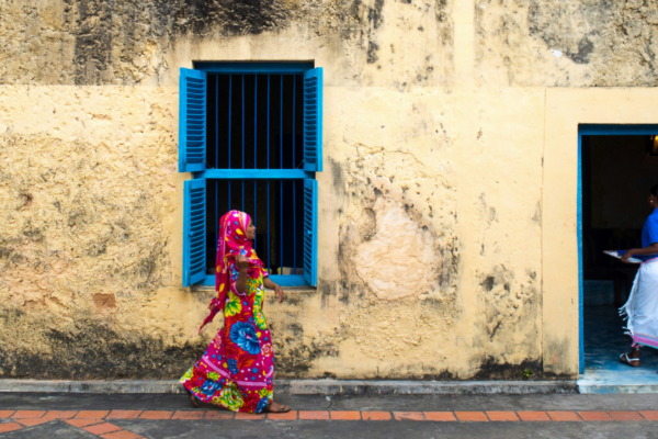 Two women walking outside in Tanzania.