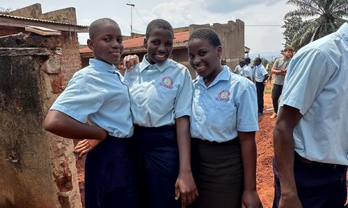 A group of students standing outside.