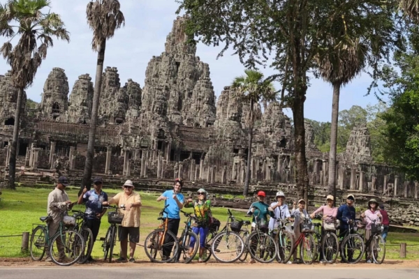 group of tourists with bike in Cambodia