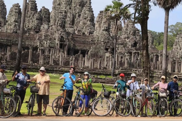 group of tourists with bike in Cambodia