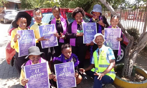 Group of kids with posters